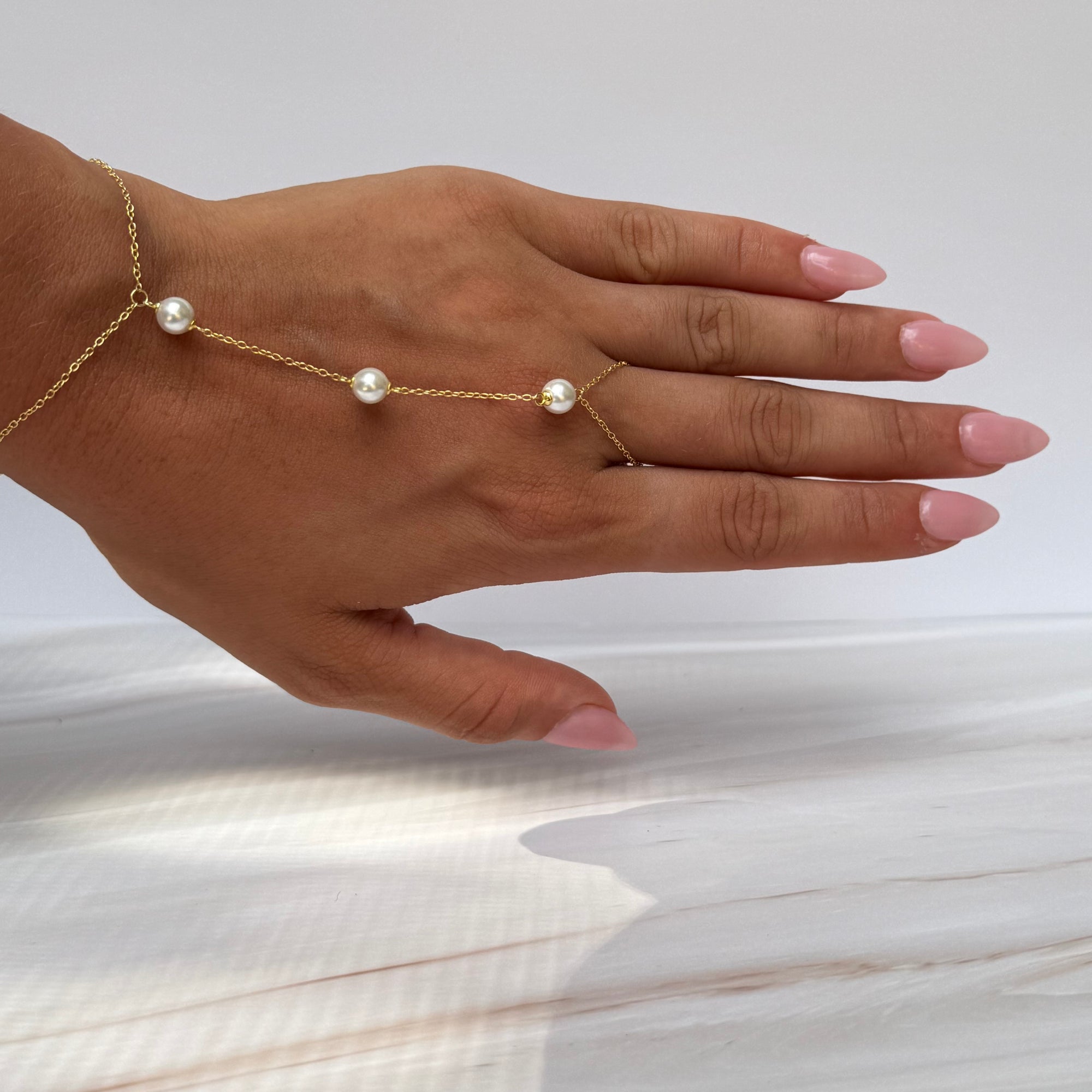 Pearls Halo Spark HandChain