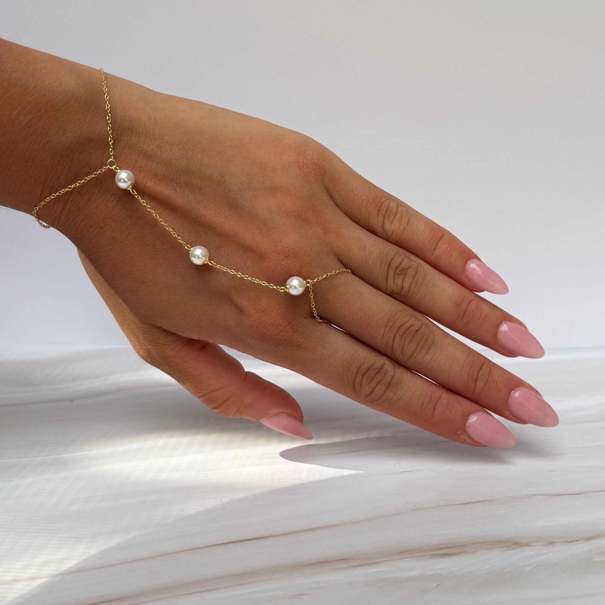 Pearls Halo Spark HandChain