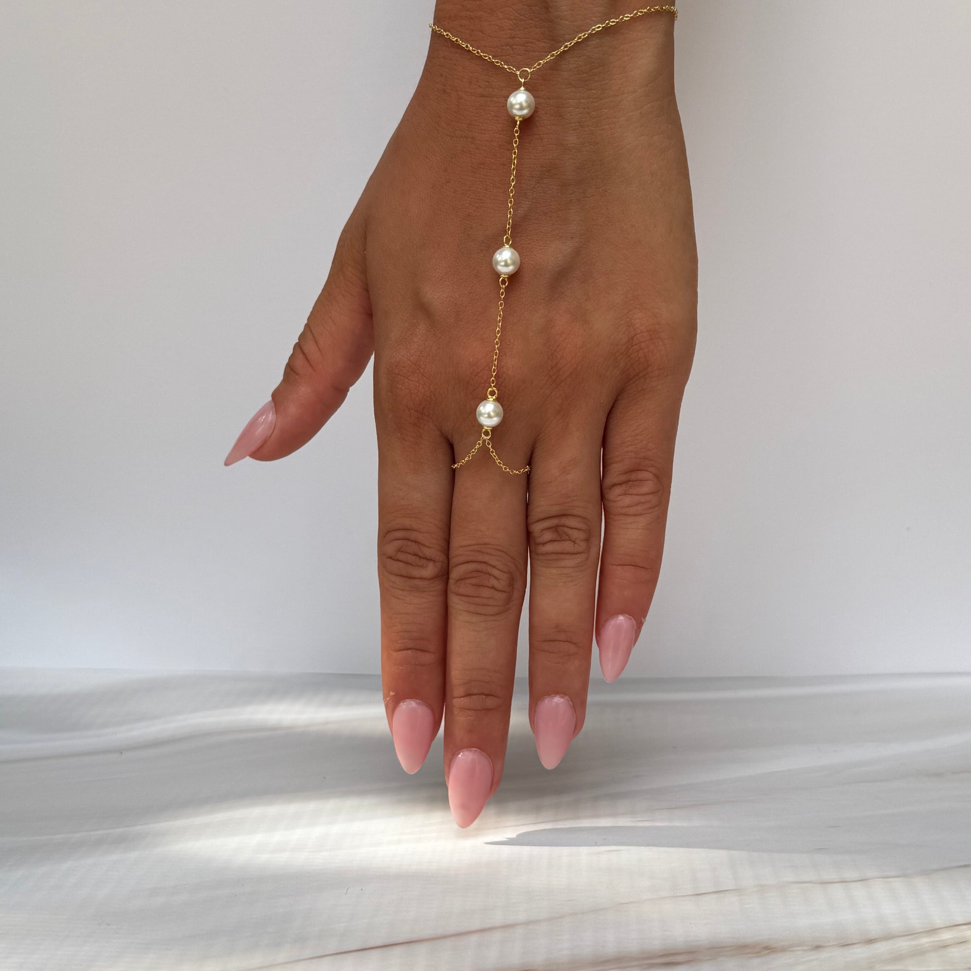 Pearls Halo Spark HandChain